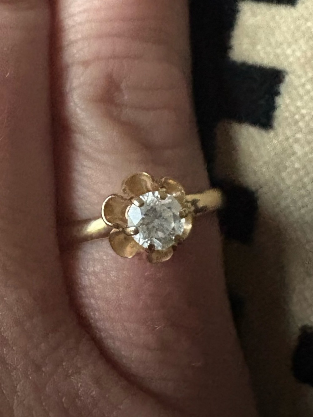 Gold diamond ring in Buttercup setting